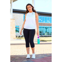 Load image into Gallery viewer, Julia Rose The Cassandra black capri leggings with pockets, Women wearing black capri pocket leggings