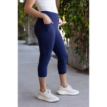 Load image into Gallery viewer, Julia Rose The Nova navy capri leggings with pocket, Women wearing navy capri leggings with side pocket