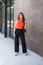 Load image into Gallery viewer, High-waisted black wide leg pants with pockets by Julia Rose, Julia Rose women’s wide leg pants lifestyle image