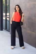 Load image into Gallery viewer, High-waisted black wide leg pants with pockets by Julia Rose, Julia Rose women’s wide leg pants lifestyle image