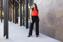 Load image into Gallery viewer, High-waisted black wide leg pants with pockets by Julia Rose, Julia Rose women’s wide leg pants lifestyle image
