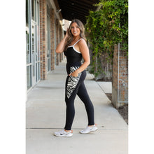 Load image into Gallery viewer, Women’s black leggings with zebra print panels Stretchy leggings withflattering fit"