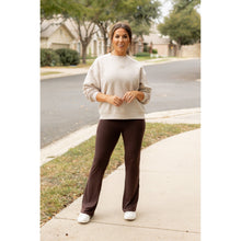 Load image into Gallery viewer, High-waisted brown bootcut leggings with pockets by Julia Rose, Julia Rose women’s brown flared leggings lifestyle image