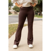 Load image into Gallery viewer, High-waisted brown bootcut leggings with pockets by Julia Rose, Julia Rose women’s brown flared leggings lifestyle image