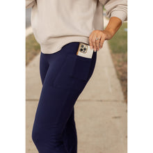 Load image into Gallery viewer, Full length navy bootcut leggings with side pockets Flattering women’s bootcut leggings in navy blue by Julia Rose