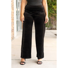 Load image into Gallery viewer, Women’s flowy velvet wide leg holiday pants. Velvet wide leg trousers styled for holiday outfits
