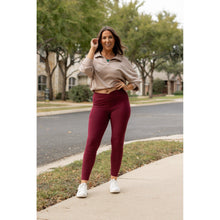 Load image into Gallery viewer, High-waisted maroon crossover leggings with pockets by Julia Rose, Julia Rose women’s maroon full length leggings lifestyle image