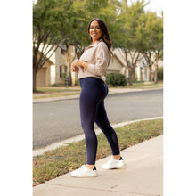 Load image into Gallery viewer, High-waisted navy crossover leggings with pockets by Julia Rose, Julia Rose women’s navy full length leggings lifestyle image