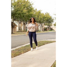 Load image into Gallery viewer, High-waisted navy crossover leggings with pockets by Julia Rose, Julia Rose women’s navy full length leggings lifestyle image