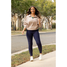 Load image into Gallery viewer, High-waisted navy crossover leggings with pockets by Julia Rose, Julia Rose women’s navy full length leggings lifestyle image