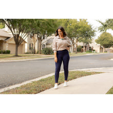 Load image into Gallery viewer, High-waisted navy crossover leggings with pockets by Julia Rose, Julia Rose women’s navy full length leggings lifestyle image