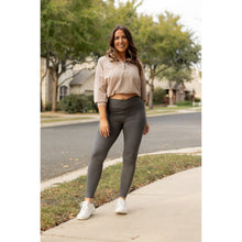 Load image into Gallery viewer, High-waisted charcoal crossover leggings with pockets by Julia Rose, Julia Rose women’s charcoal full length leggings lifestyle image