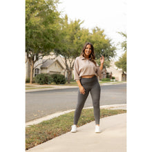 Load image into Gallery viewer, High-waisted charcoal crossover leggings with pockets by Julia Rose, Julia Rose women’s charcoal full length leggings lifestyle image