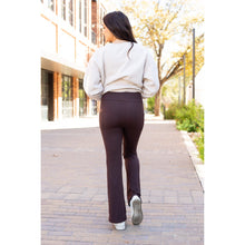 Load image into Gallery viewer, High-waisted brown bootcut leggings with pockets by Julia Rose, Julia Rose women’s brown flared leggings lifestyle image