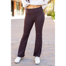 Load image into Gallery viewer, High-waisted brown bootcut leggings with pockets by Julia Rose, Julia Rose women’s brown flared leggings lifestyle image