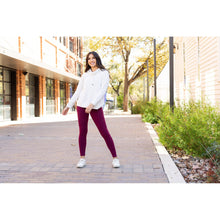 Load image into Gallery viewer, High-waisted maroon crossover leggings with pockets by Julia Rose, Julia Rose women’s maroon full length leggings lifestyle image