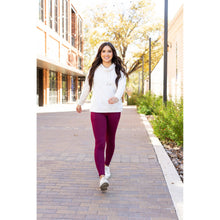 Load image into Gallery viewer, High-waisted maroon crossover leggings with pockets by Julia Rose, Julia Rose women’s maroon full length leggings lifestyle image