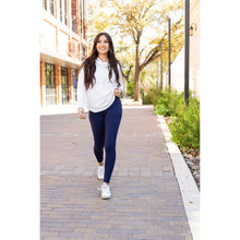 Load image into Gallery viewer, High-waisted navy crossover leggings with pockets by Julia Rose, Julia Rose women’s navy full length leggings lifestyle image