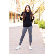 Load image into Gallery viewer, High-waisted charcoal crossover leggings with pockets by Julia Rose, Julia Rose women’s charcoal full length leggings lifestyle image