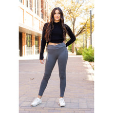 Load image into Gallery viewer, High-waisted charcoal crossover leggings with pockets by Julia Rose, Julia Rose women’s charcoal full length leggings lifestyle image