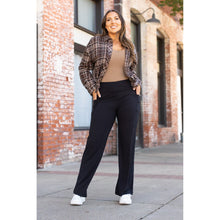 Load image into Gallery viewer, High-waisted black wide leg pants with pockets by Julia Rose, Julia Rose women’s wide leg pants lifestyle image
