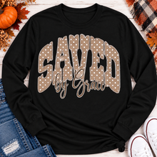 Load image into Gallery viewer, Saved by Grace faith graphic apparel with polka dot lettering, available in brown, navy and black V-neck, long sleeve, crewneck and hoodie styles.