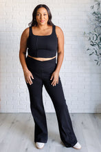 Load image into Gallery viewer, Building Habits Twill Flared Crossover Waist Pant in Black