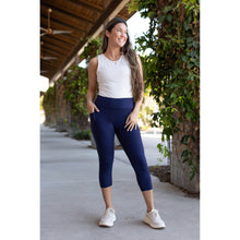 Load image into Gallery viewer, Julia Rose The Nova navy capri leggings with pocket, Women wearing navy capri leggings with side pocket