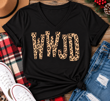 Load image into Gallery viewer, shirt with tan leopard-print WWJD lettering in a rustic holiday flat lay.