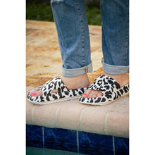 Load image into Gallery viewer, White leopard-print beach slides with a bold spotted pattern and easy slip-on design