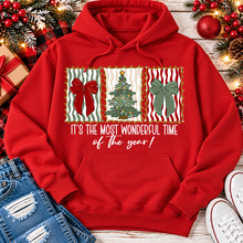 Load image into Gallery viewer, Red Christmas hoodie with festive bow and Christmas tree artwork in vintage holiday frames and It's the Most Wonderful Time of the Year graphic.