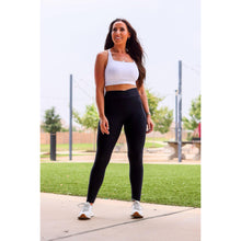 Load image into Gallery viewer, Julia Rose Stephanie crossover black pocket leggings, Women wearing black crossover leggings