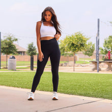 Load image into Gallery viewer, Julia Rose Stephanie crossover black pocket leggings, Women wearing black crossover leggings