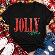 Load image into Gallery viewer, Jolly Ish Christmas graphic shirt featuring large distressed red JOLLY lettering with green handwritten ish script. Funny vintage-inspired holiday apparel available in pink and black, offered in short sleeve crewneck, V-neck, long sleeve and hoodie styles.