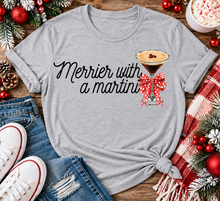 Load image into Gallery viewer, Merrier with a Martini holiday graphic apparel mockup.