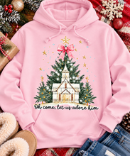 Load image into Gallery viewer, Oh Come Let Us Adore Him Christian Christmas graphic apparel with church, Christmas trees, stars and pink bow