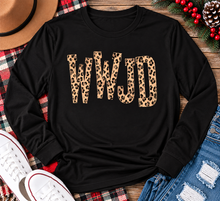Load image into Gallery viewer, shirt with tan leopard-print WWJD lettering in a rustic holiday flat lay.