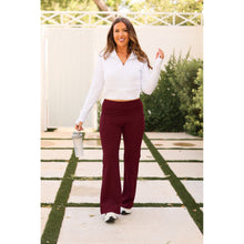 Load image into Gallery viewer, High-waisted maroon bootcut leggings with pockets by Julia Rose, Julia Rose women’s maroon flared leggings lifestyle image