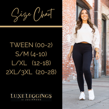 Load image into Gallery viewer, High-waisted maroon crossover leggings with pockets by Julia Rose, Julia Rose women’s maroon full length leggings lifestyle image