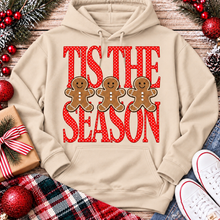 Load image into Gallery viewer, Tis the Season Christmas graphic apparel featuring red polka dot lettering and three gingerbread cookies