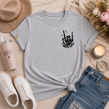 Load image into Gallery viewer, Gray crewneck graphic tee featuring a small black skeleton hand and āWife Lifeā front chest graphic.