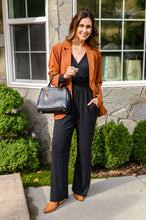 Load image into Gallery viewer, Onward & Upward Faux Wrap Jumpsuit In Black