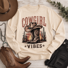 Load image into Gallery viewer, Cowgirl Vibes western graphic apparel featuring cowboy boots, cowgirl hat, cacti and desert sunset design
