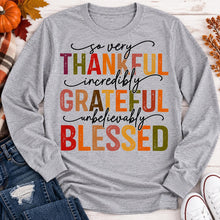 Load image into Gallery viewer, Thankful Grateful Blessed fall graphic long sleeve crewneck tee with colorful autumn lettering
