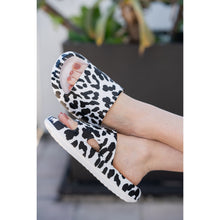 Load image into Gallery viewer, White leopard-print beach slides with a bold spotted pattern and easy slip-on design
