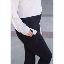 Load image into Gallery viewer, High-waisted black bootcut leggings by Julia Rose, Julia Rose women’s flared black leggings lifestyle image

