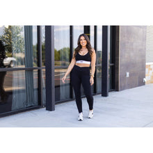 Load image into Gallery viewer, Julia Rose Stephanie crossover black pocket leggings, Women wearing black crossover leggings
