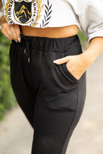 Load image into Gallery viewer, Women’s fleece-lined black joggers winter loungewear Soft black joggers with tapered leg and drawstring waist
