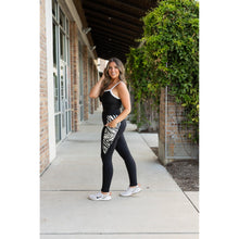 Load image into Gallery viewer, Women’s black leggings with zebra print panels  Stretchy leggings withflattering fit"
