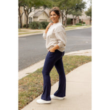 Load image into Gallery viewer, Full length navy bootcut leggings with side pockets Flattering women’s bootcut leggings in navy blue by Julia Rose
